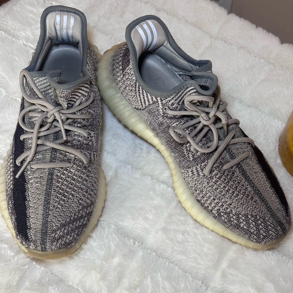 Yeezy Athletic Shoes in Gray and Black.